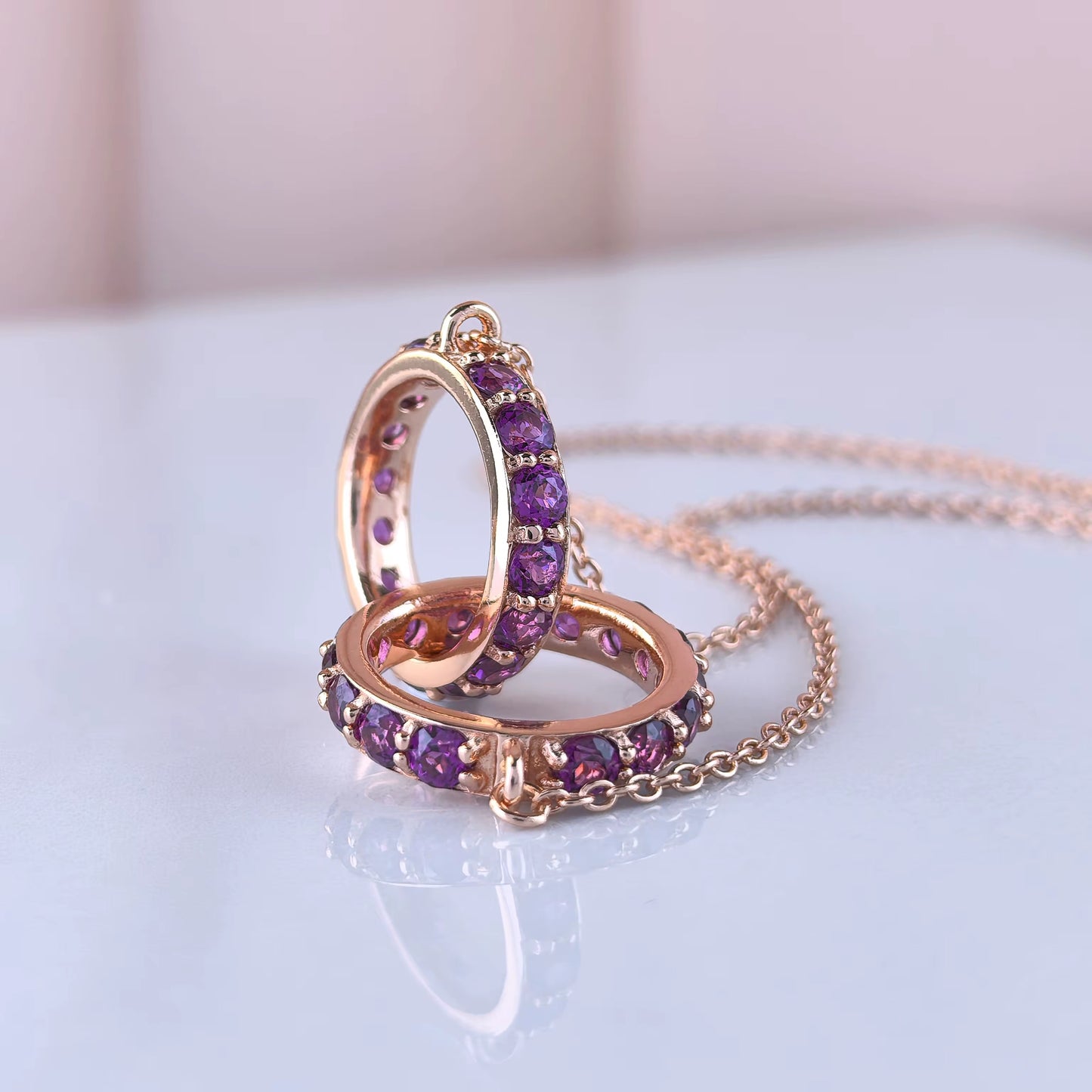 Interlocking Garnet Rings Necklace