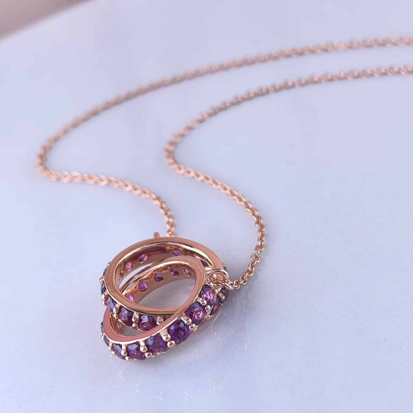 Interlocking Garnet Rings Necklace